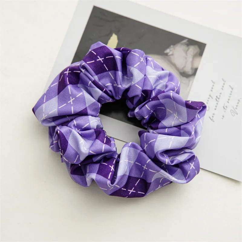 Purple striped hair tie