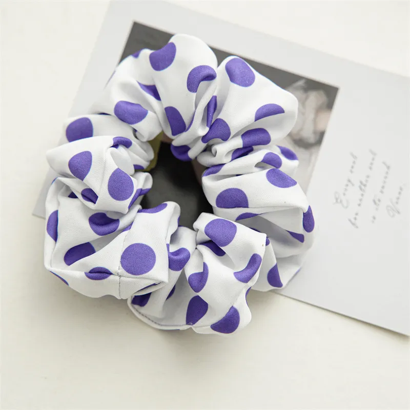 Purple dotted hair tie