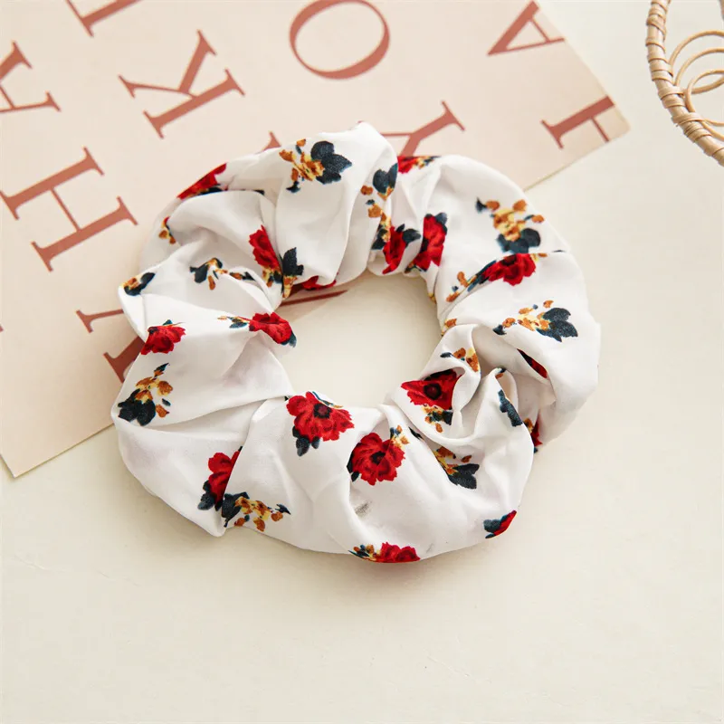 White floral hair tie