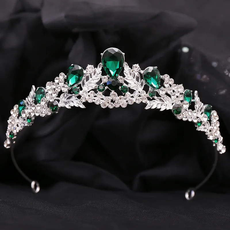 Women's crown with green stones