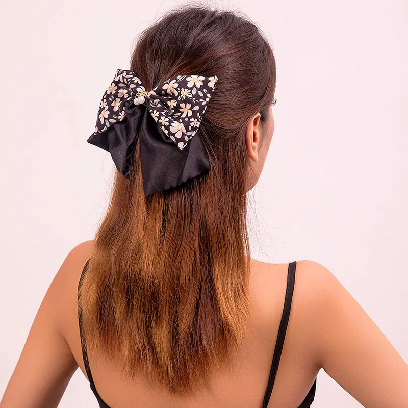 Floral bow hair clip