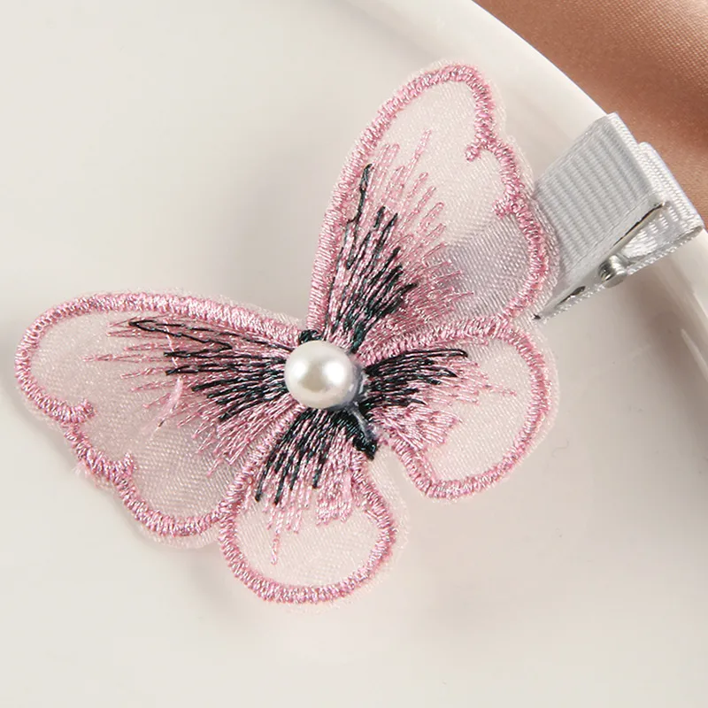 Pink butterfly hair clip
