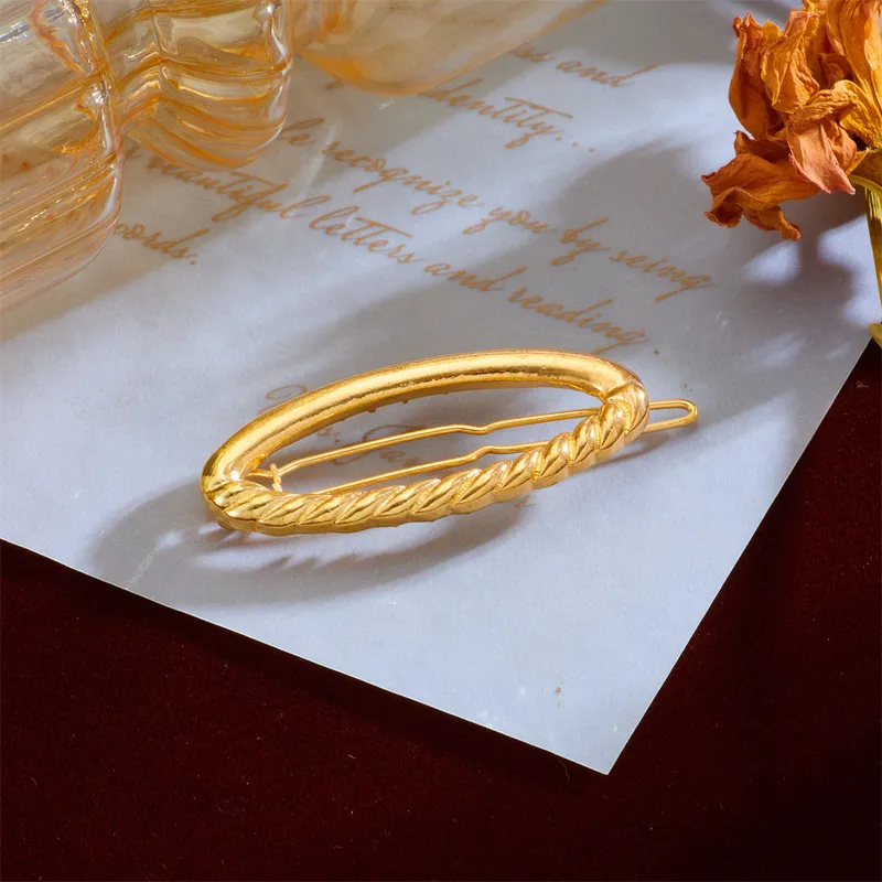 Gold oval hair clip