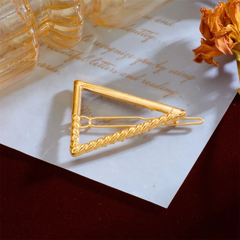 Golden triangle hair clip