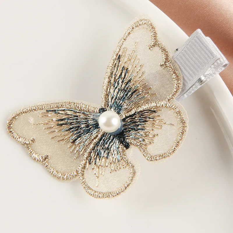 Beige butterfly hair clip