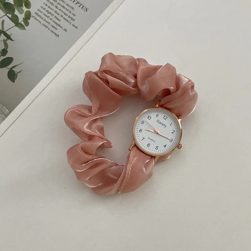 Pink fabric belt watch
