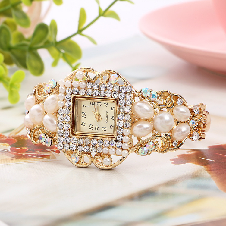A luxurious gold studded watch