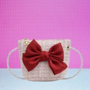 A bag with a big bow