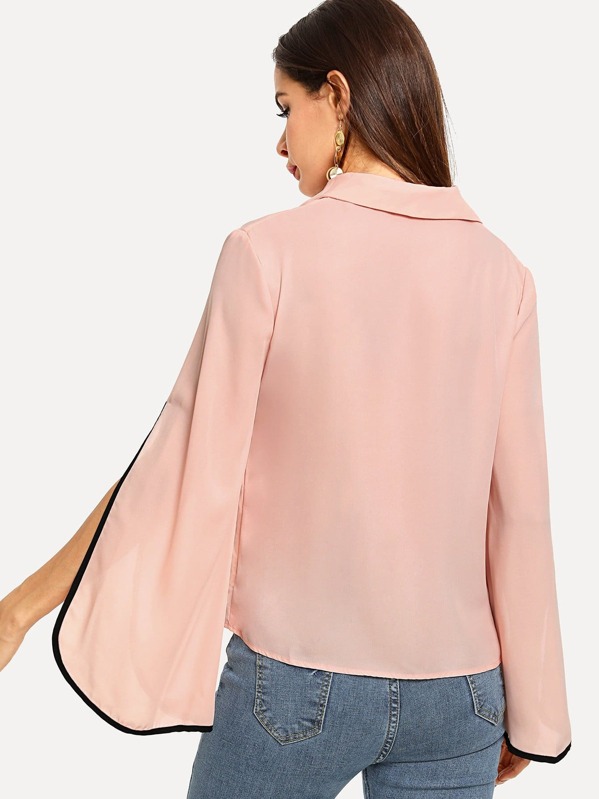 Pink blouse with wide sleeves